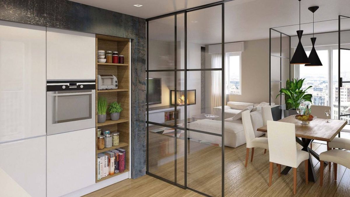 Los paneles correderos de vidrio permiten dividir espacios sin perder luz ni amplitud visual.