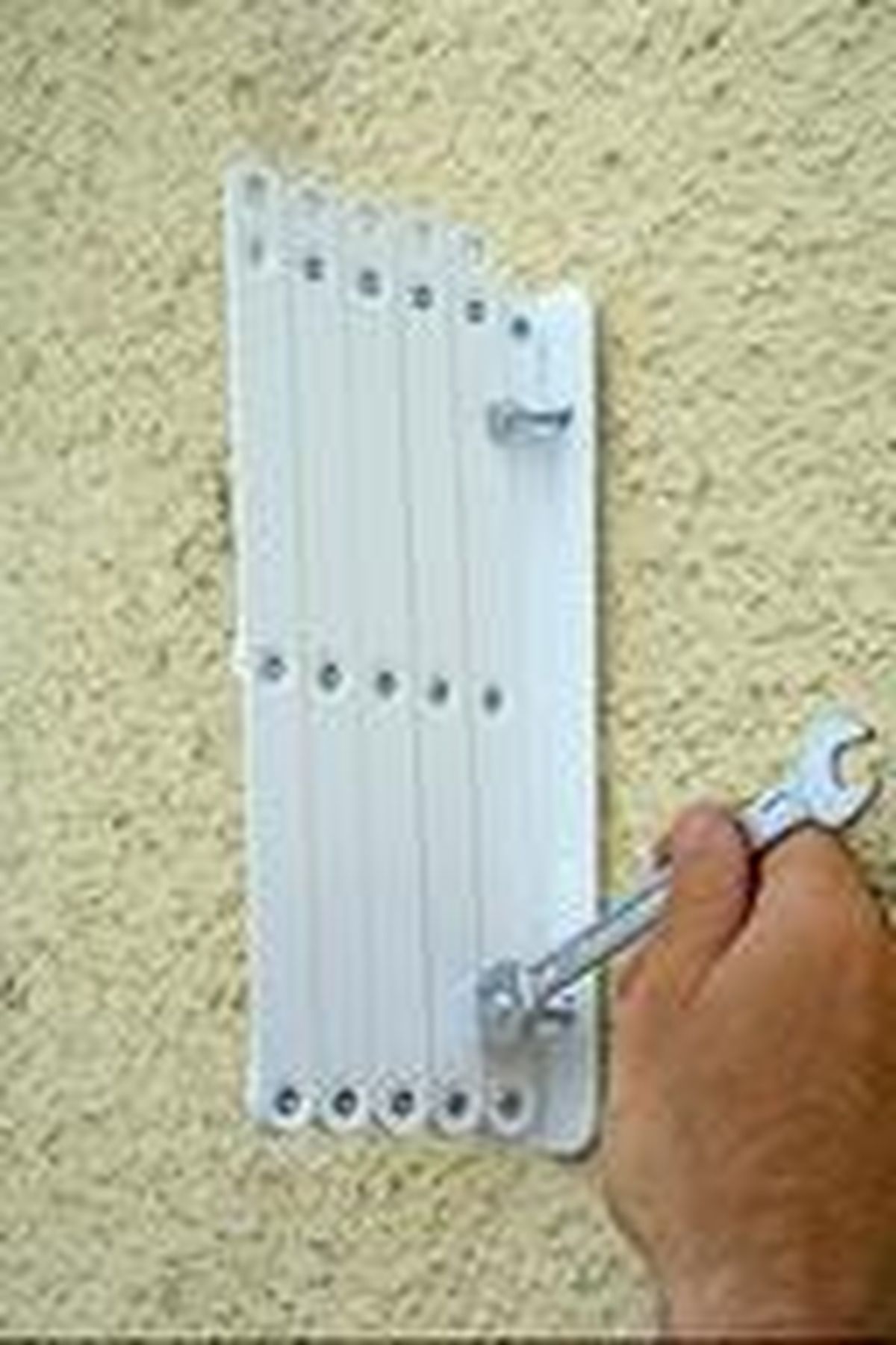 Colocar un tendedero de ropa extensible paso 2