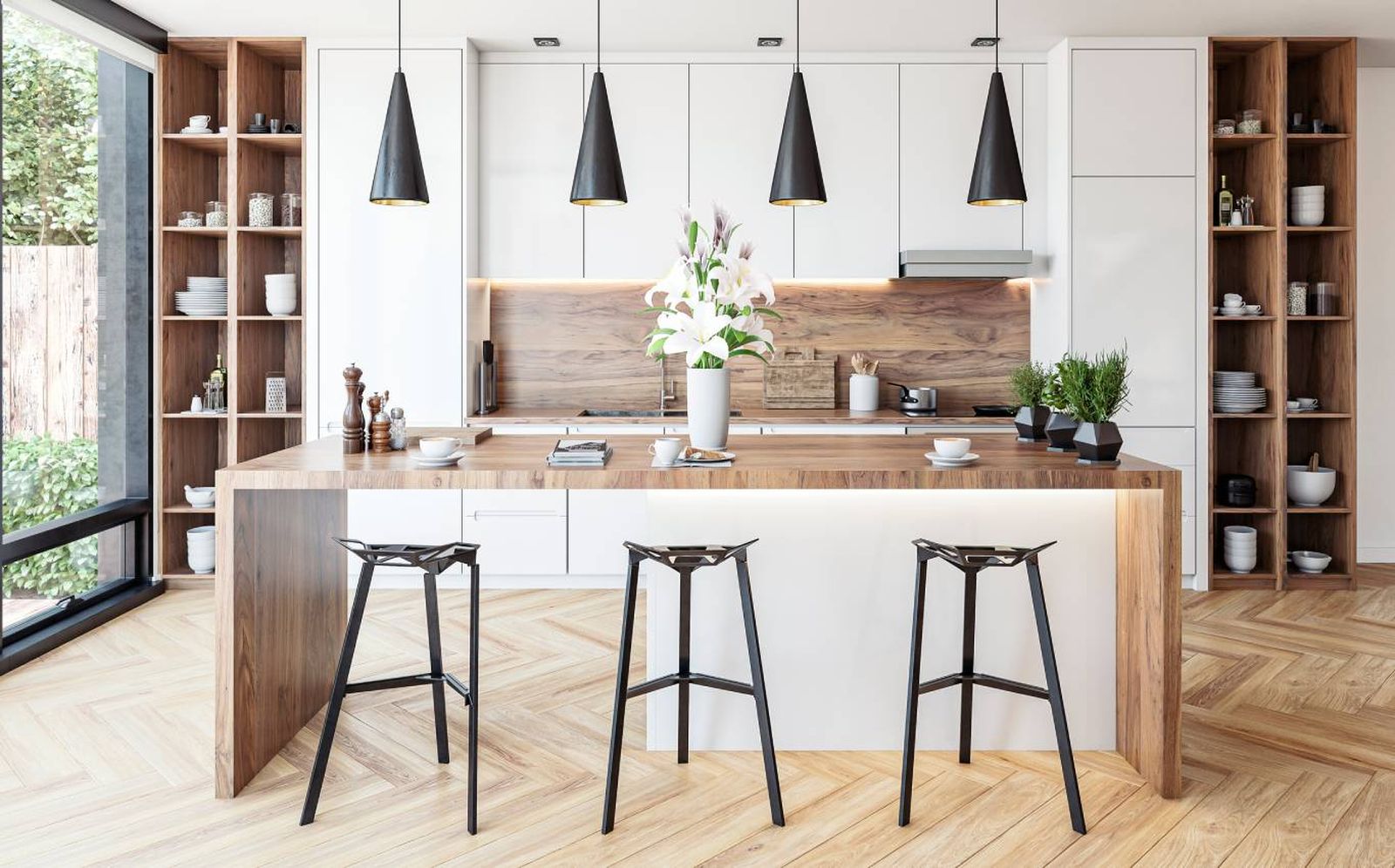 Cocina con isla decorada con los complementos adecuados. Cocina con isla decorada con los complementos adecuados.