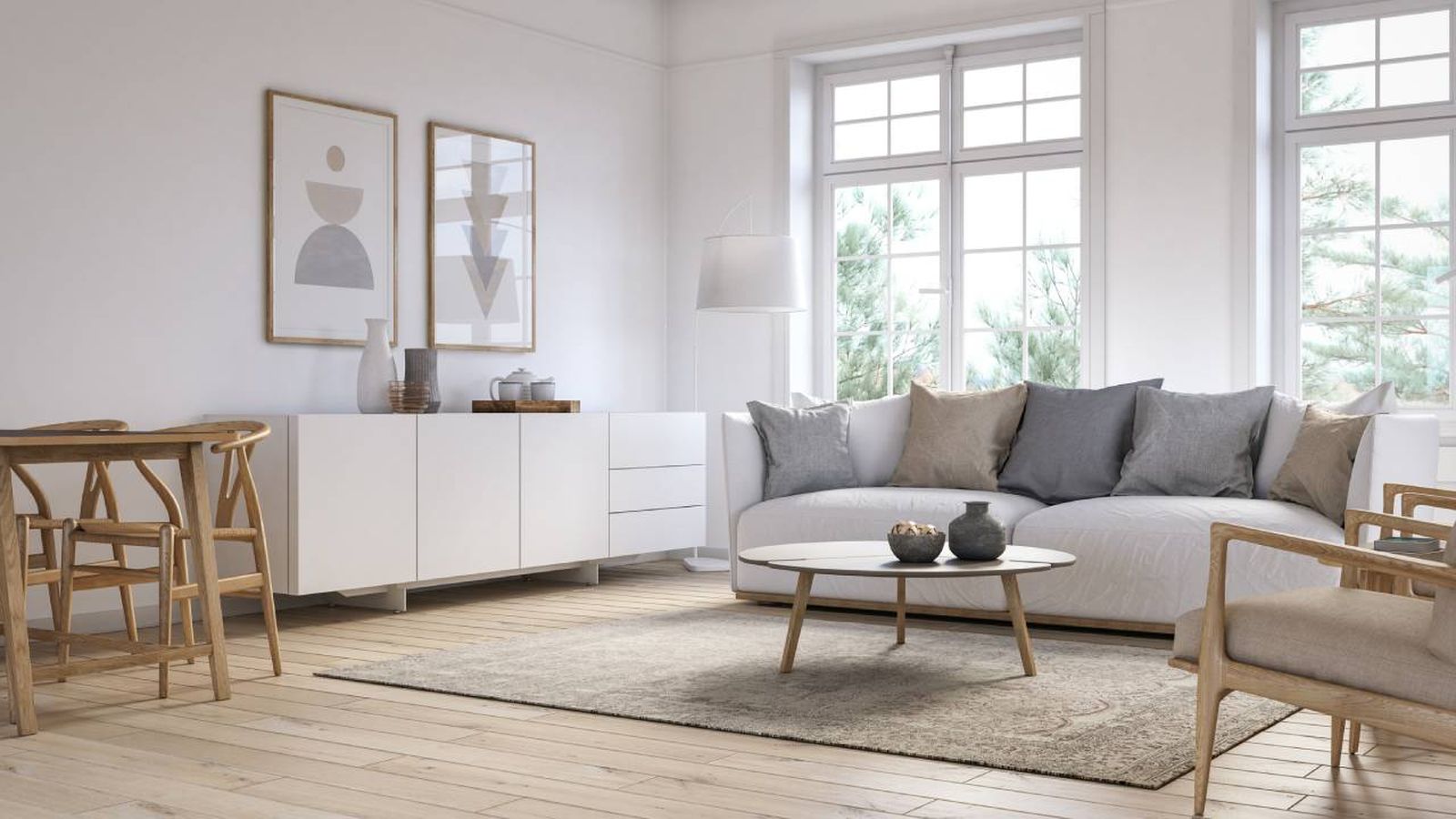 Salón gris elegante con muebles blancos.