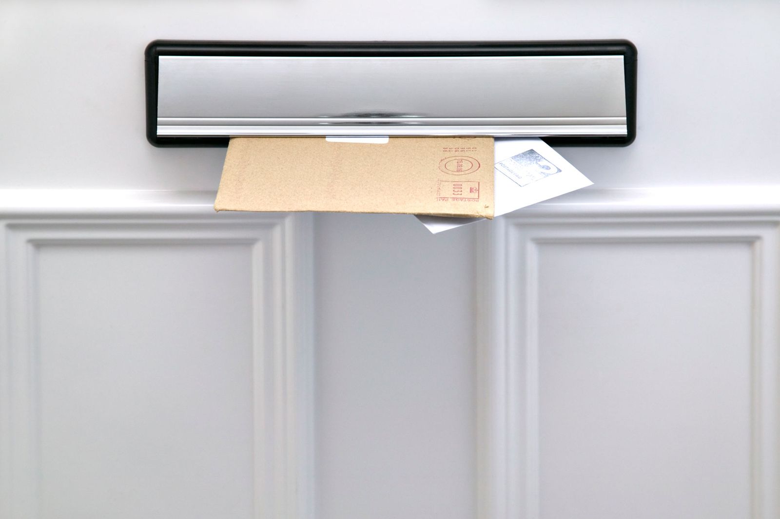 Colocar buzón en una puerta