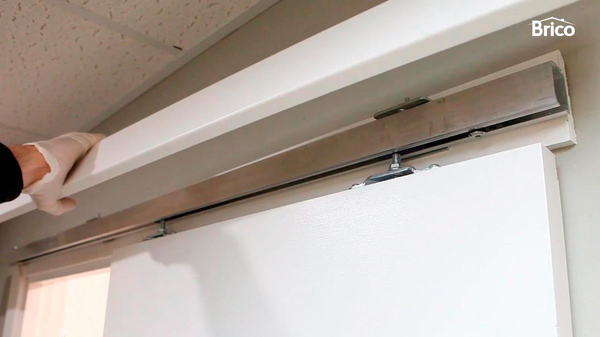 Como regular una puerta corredera paso 4