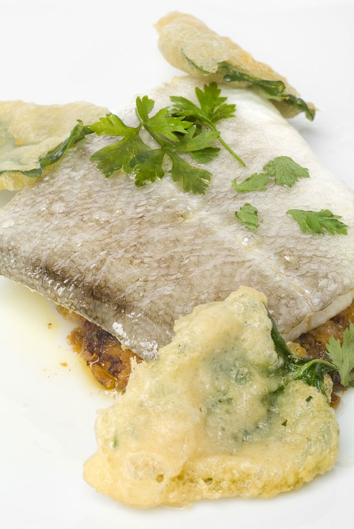 Bacalao confitado con tortitas de garbanzos