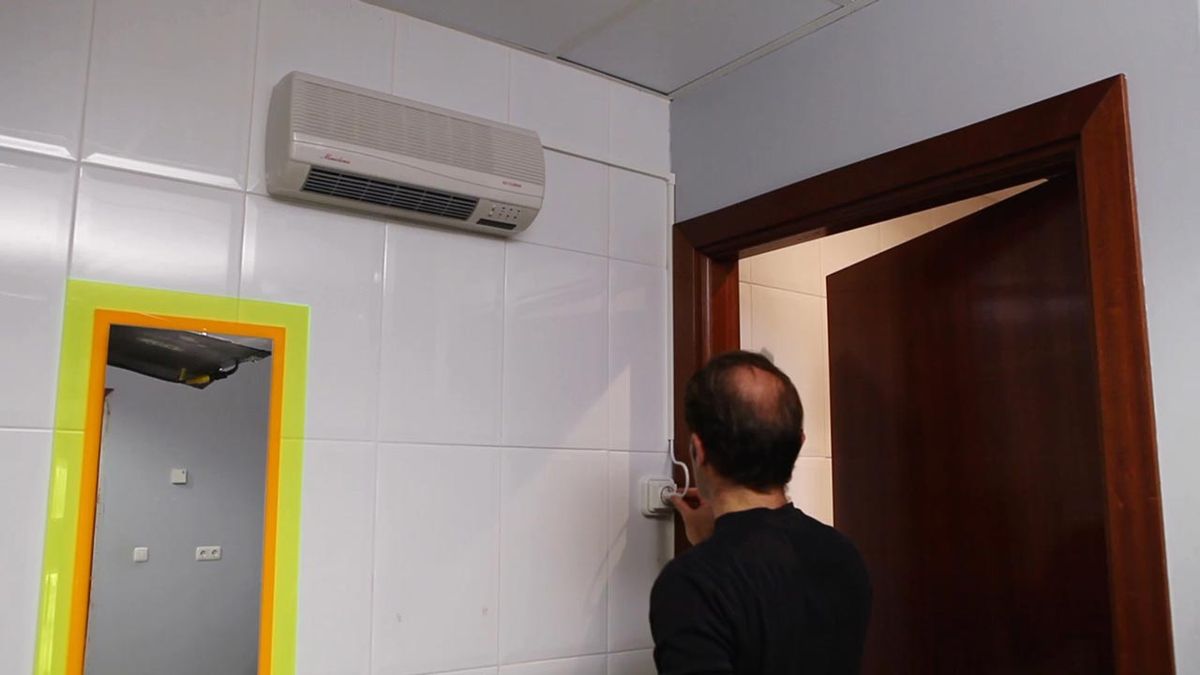 Cómo instalar un calefactor eléctrico de pared paso 13