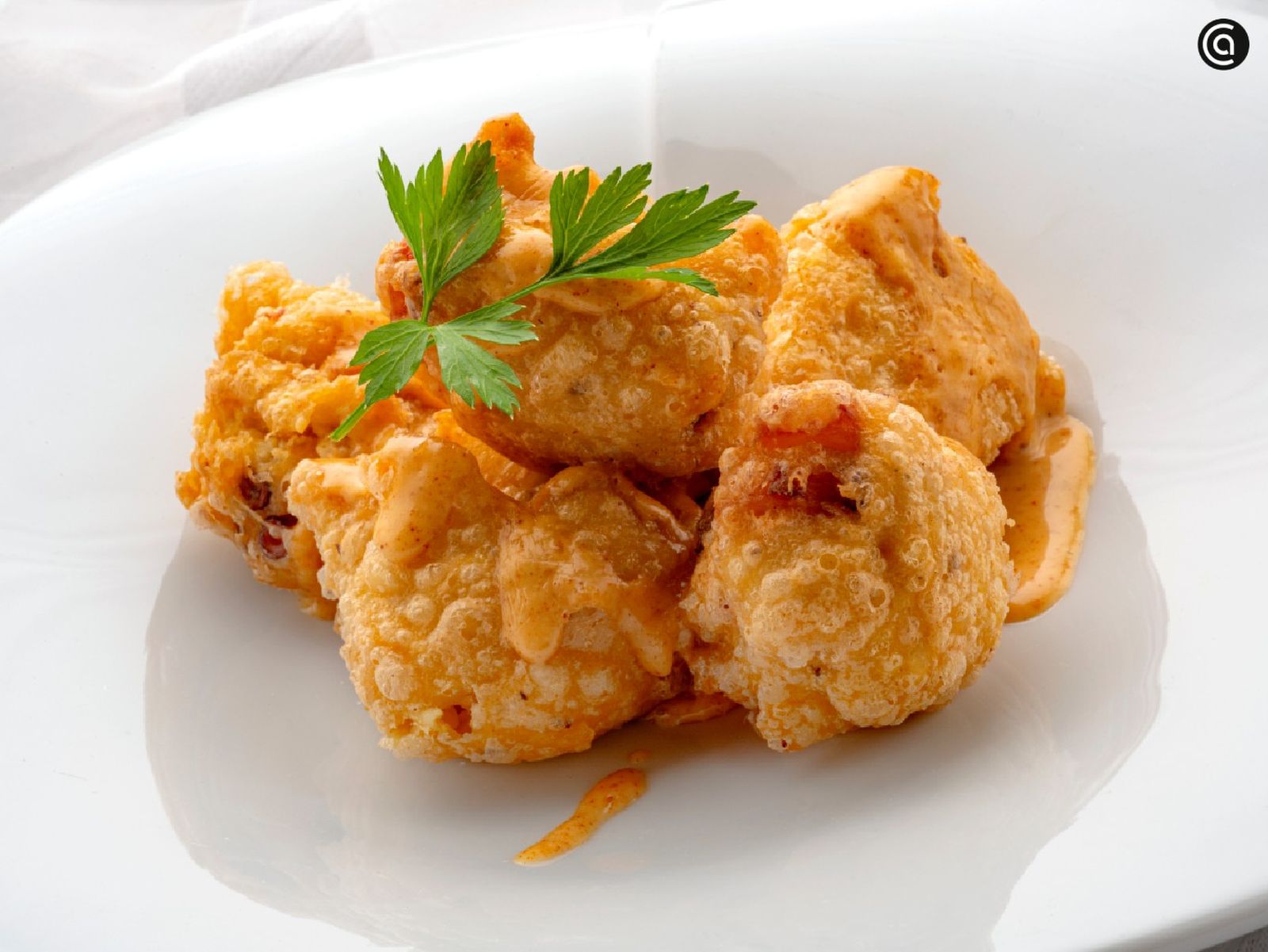 Bueñuelos de pulpo con salsa brava, receta crujiente de Karlos Arguiñano