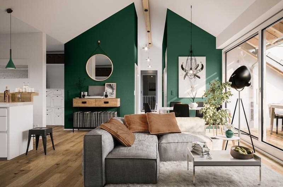 Salón con paredes en verde y blanco.