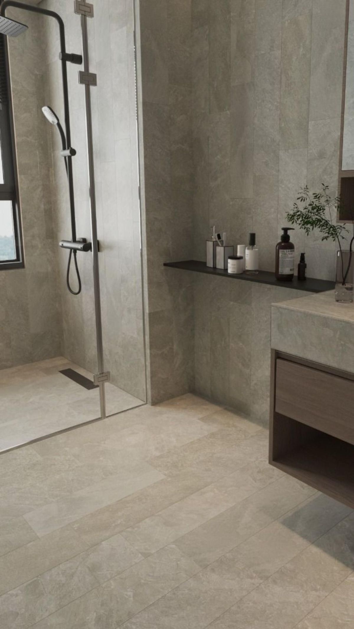 La combinación de azulejos en tonos sencillos y piedra es una opción moderna y acogedora.