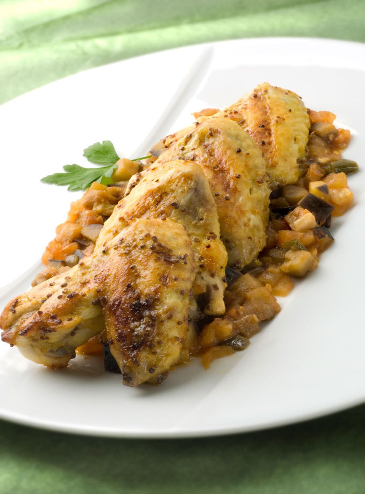 Alitas de mostaza con pisto