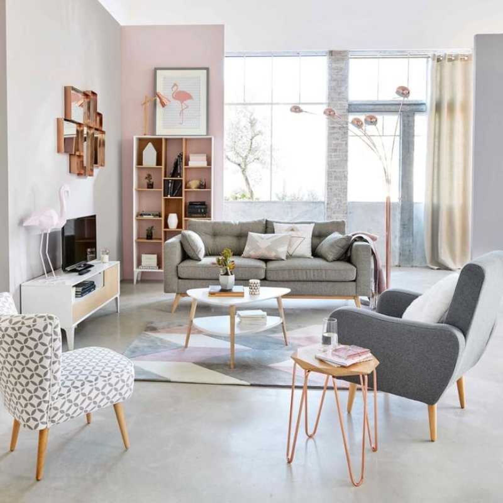 Salón con butacas de estilo escandinavo en gris y estampada. Salón con butacas de estilo escandinavo en gris y estampada.