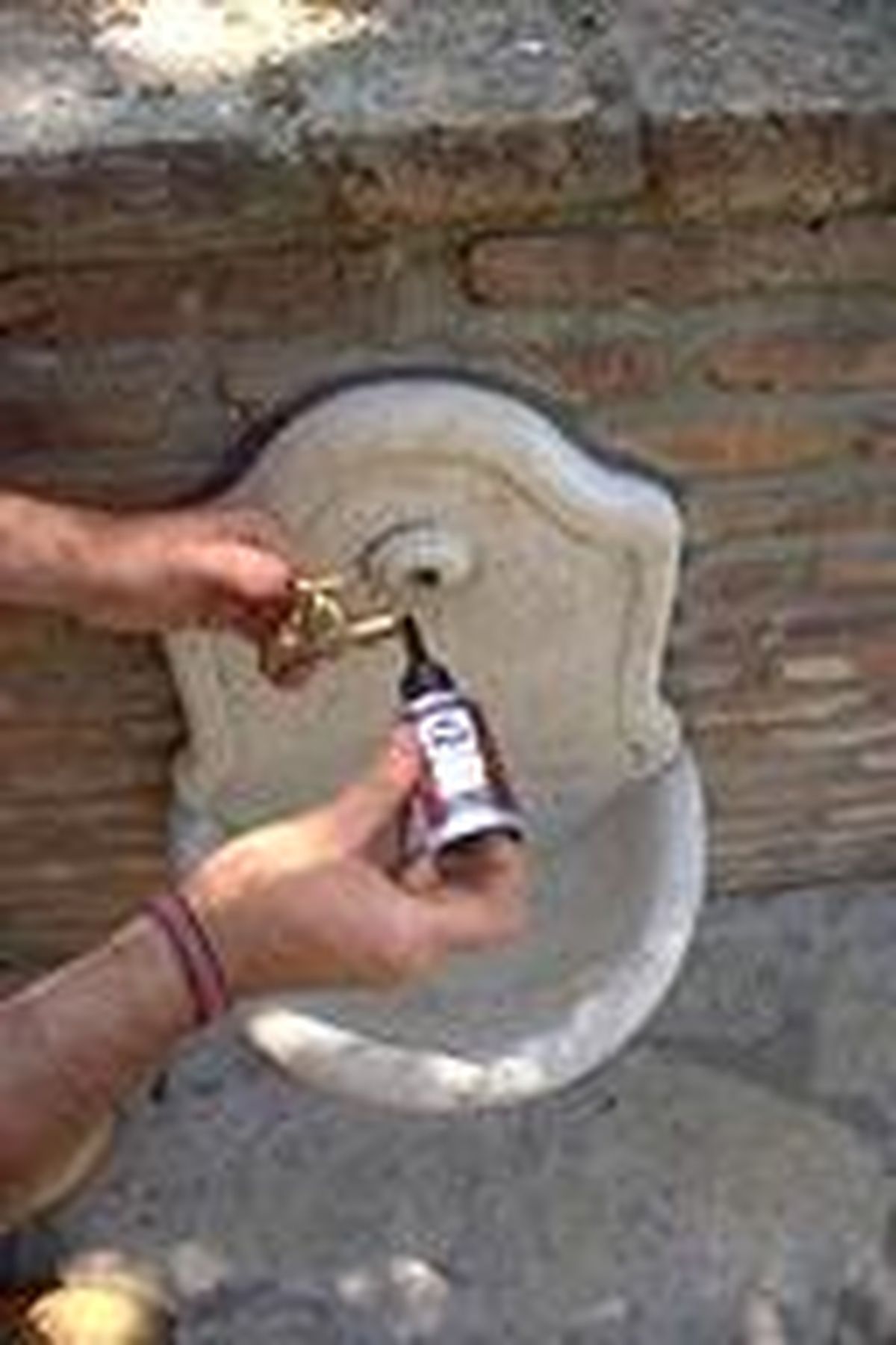 Fuente de piedra artificial paso 10