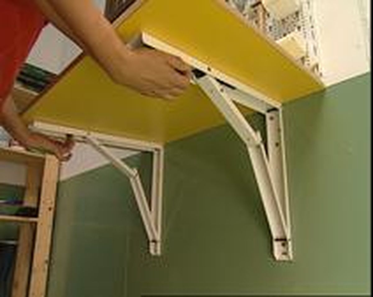 brico 0467 2 Instalacion mesa auxiliar abatible xl